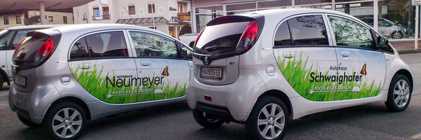 Autohaus Neumayer Radstadt - Autohaus Schwaighofer Russbach - Autobeschriftung Elektroautos mit Digitaldruck auf Autohochleistungsfolie Autohaus Neumayer Radstadt - Autohaus Schwaighofer Russbach - Autobeschriftung Elektroautos mit Digitaldruck auf Autohochleistungsfolie