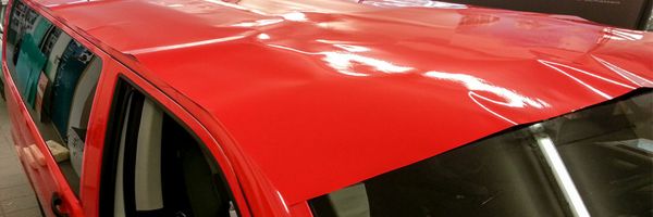 Atomic - VW-Bus Vollfolierung mit gegossener roter Wrappingfolie, Beschriftung mit weisser Hochleistungsfolie (5) Atomic - VW-Bus Vollfolierung mit gegossener roter Wrappingfolie, Beschriftung mit weisser Hochleistungsfolie (5)